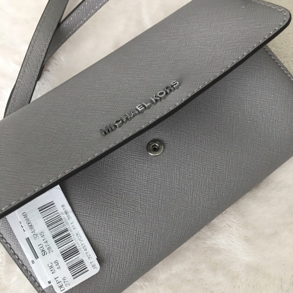 NWT Michael Kors wallet crossbody. Make offer
